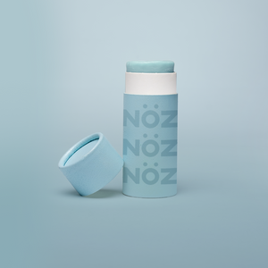 A bottle from blue, vegan, cruelty-free- reef safe Noz sunscreen