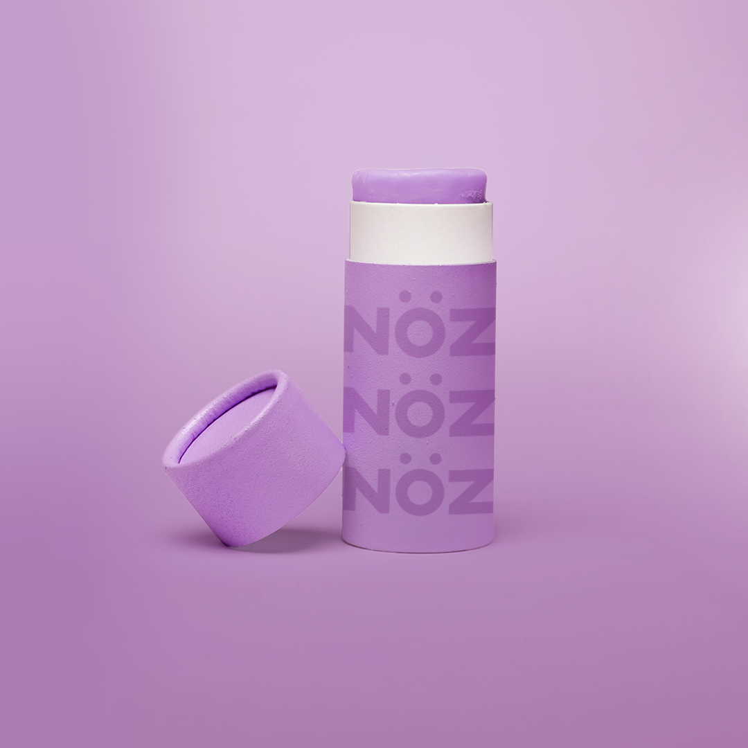 A bottle from purple, vegan, cruelty-free- reef safe Noz sunscreen