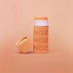 Load image into Gallery viewer, A bottle from orange, vegan, cruelty-free- reef safe Noz sunscreen
