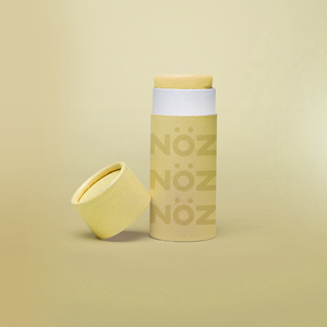 A bottle from yellow vegan, cruelty-free- reef safe Noz sunscreen