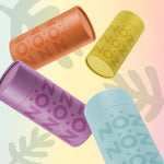 Load image into Gallery viewer, Blue, yellow, orange, and purple bottles from vegan Noz sunscreen in an angle 
